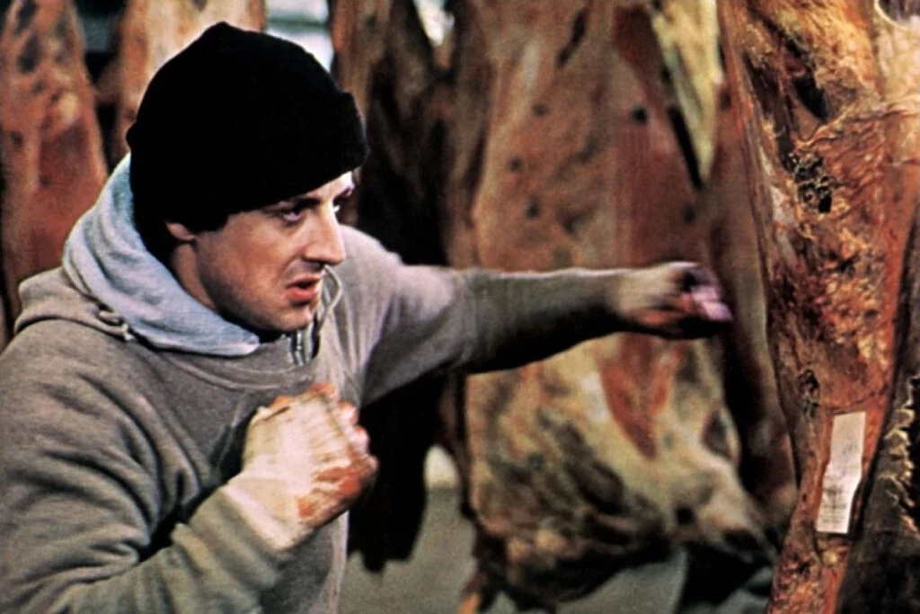 Фільм Роккі 1 (1976)

Роккі б'є м'ясну тушу. Тренування Роккі Бальбоа